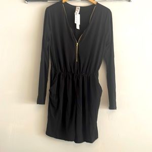 Black shorts, romper by espresso size extra-large fits like a large.